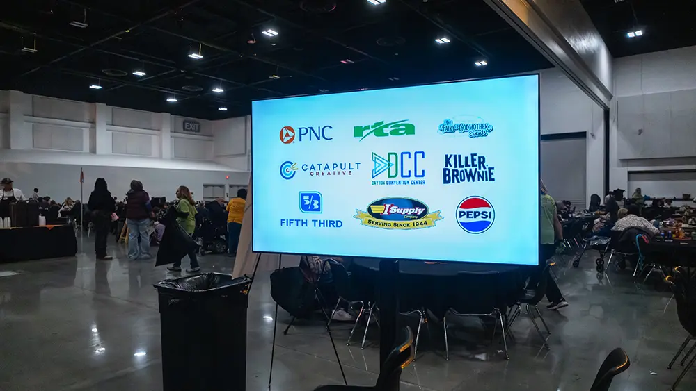 Display showing some Feast of Giving sponsors